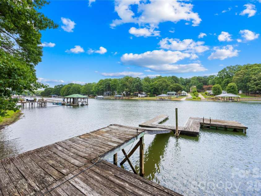 114 Forest Cove Lane, Mooresville, NC 28117.  MLS# CAR4405584, YatesRealty ID 40686. Floating dock