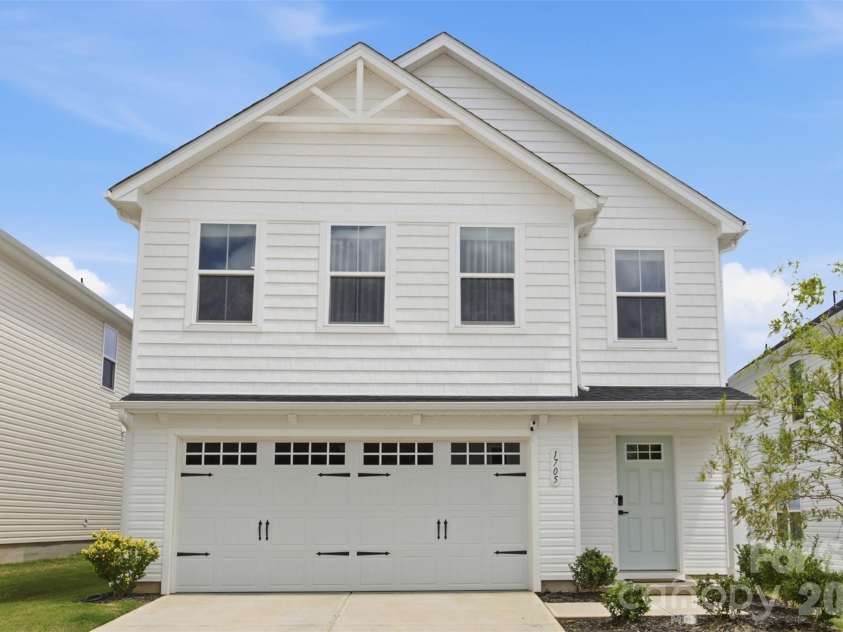 1705 Gutter Branch Drive, Charlotte, NC 28216.  MLS# CAR4404002, YatesRealty ID 40698. Exterior - Front