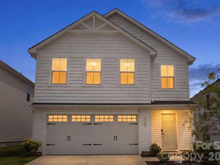1705 Gutter Branch Drive, Charlotte, NC 28216.  MLS# CAR4404002, YatesRealty ID 40698. Exterior Side