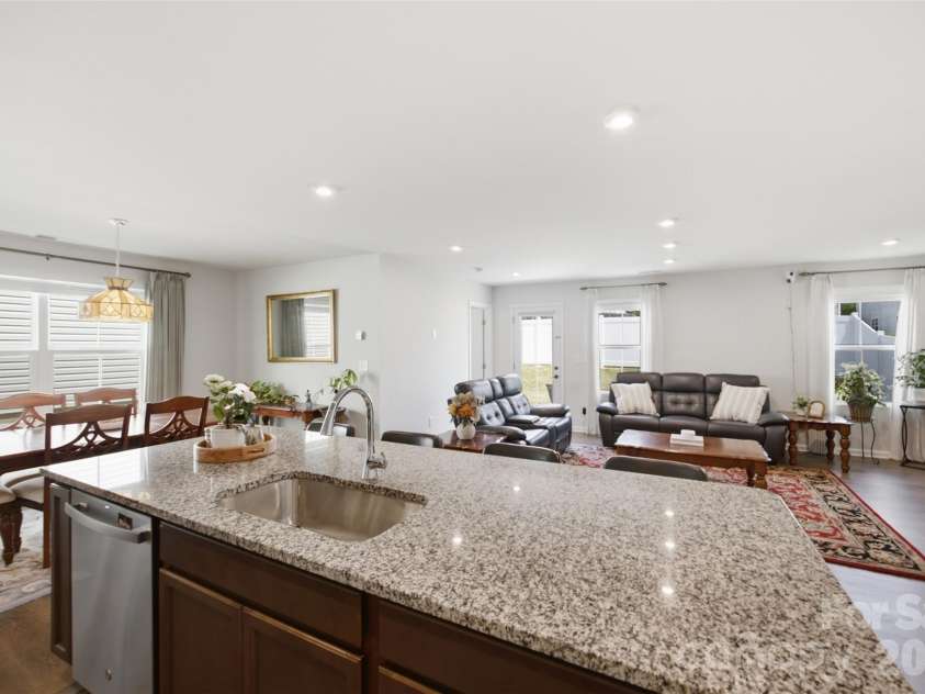 1705 Gutter Branch Drive, Charlotte, NC 28216.  MLS# CAR4404002, YatesRealty ID 40698. Kitchen/Dining/Living Room