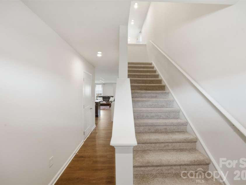 1705 Gutter Branch Drive, Charlotte, NC 28216.  MLS# CAR4404002, YatesRealty ID 40698. Stair to Second Floor