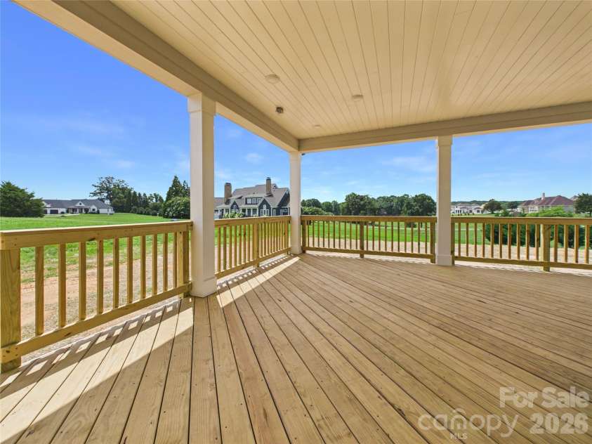 1065 Rolling Meadows Drive, Mooresville, NC 28115.  MLS# CAR4403382, YatesRealty ID 40700. Covered Deck off the Kitchen.