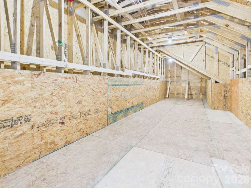 1065 Rolling Meadows Drive, Mooresville, NC 28115.  MLS# CAR4403382, YatesRealty ID 40700. Unfinished storage room