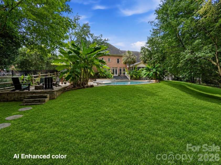 10427 Hadleigh Place, Charlotte, NC 28210.  MLS# CAR4409371, YatesRealty ID 40721. AI Enhanced yard color