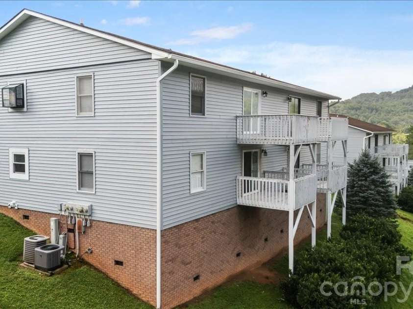 75 Nazarene Way, Waynesville, NC 28785.  MLS# CAR4409225, YatesRealty ID 40726. Views while you relax on the deck