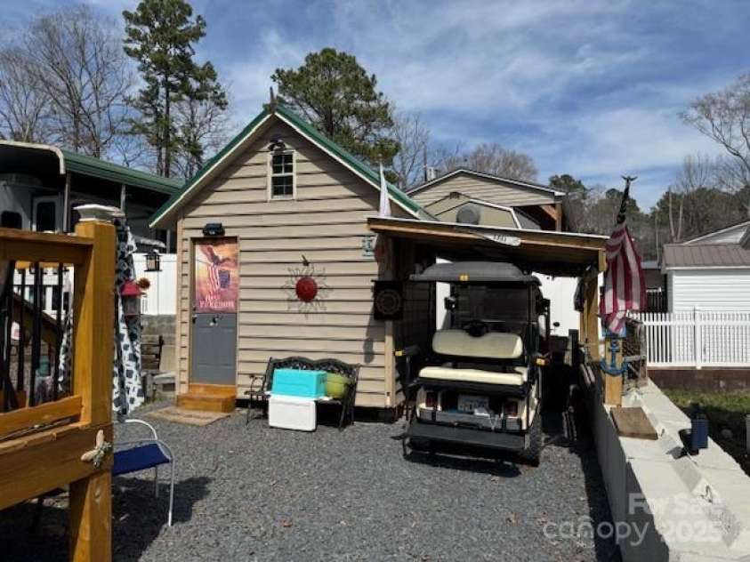 120 Cherokee Trail, Mount Gilead, NC 27306.  MLS# CAR4240056, YatesRealty ID 4073. Bldg golf cart parking