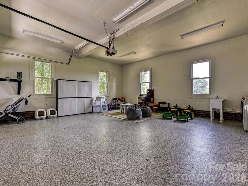 34272 Mabry Road, Albemarle, NC 28001.  MLS# CAR4407397, YatesRealty ID 40738. Rear-load garage with epoxy floor and its own mini-split