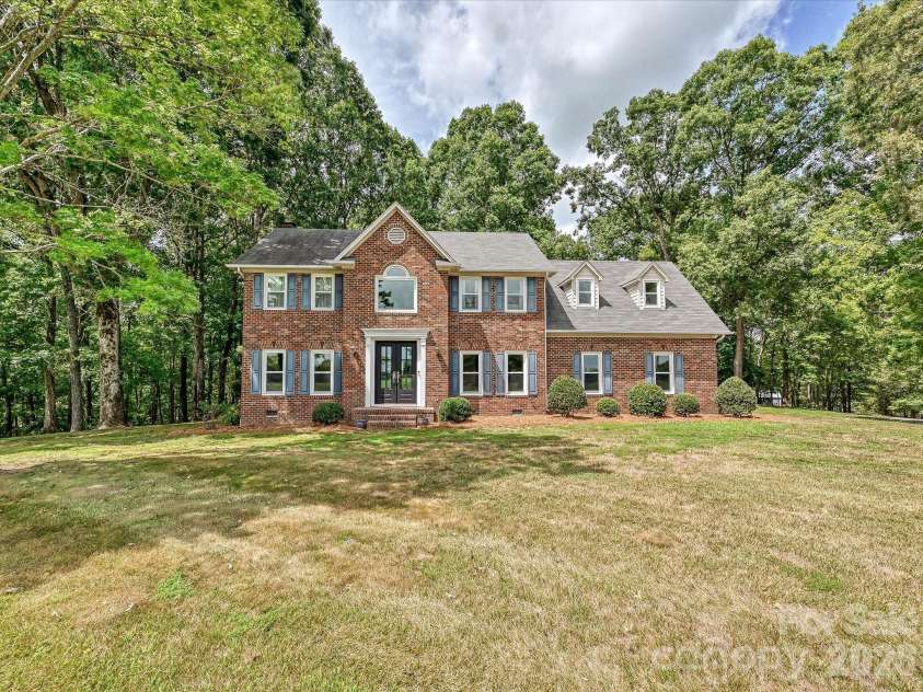 34272 Mabry Road, Albemarle, NC 28001.  MLS# CAR4407397, YatesRealty ID 40738. Traditional full-brick front elevation, move-in ready