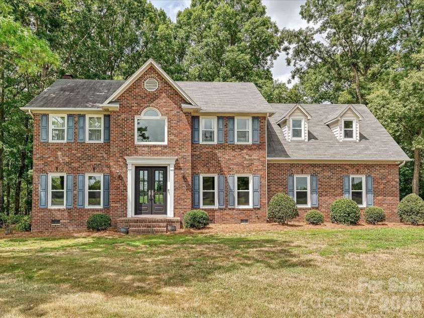 34272 Mabry Road, Albemarle, NC 28001.  MLS# CAR4407397, YatesRealty ID 40738. Traditional full-brick front elevation, move-in ready