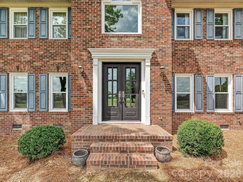 34272 Mabry Road, Albemarle, NC 28001.  MLS# CAR4407397, YatesRealty ID 40738. Traditional full-brick front elevation, move-in ready