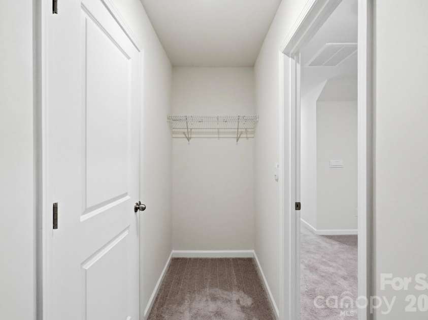 115 Shayna Road, Troutman, NC 28166.  MLS# CAR4407624, YatesRealty ID 40740. Additional storage keeps everything organized.