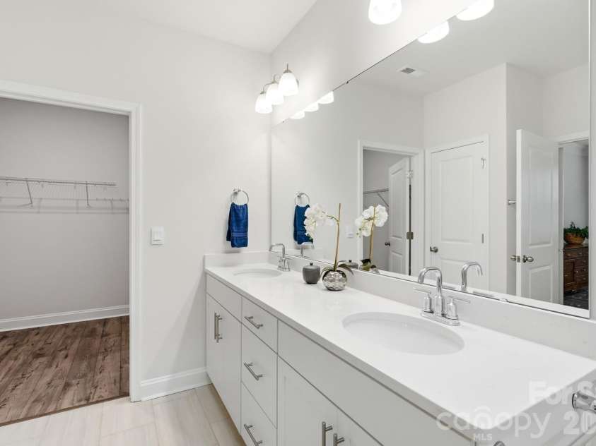 115 Shayna Road, Troutman, NC 28166.  MLS# CAR4407624, YatesRealty ID 40740. Beautiful finishes continue throughout the owner's bath.