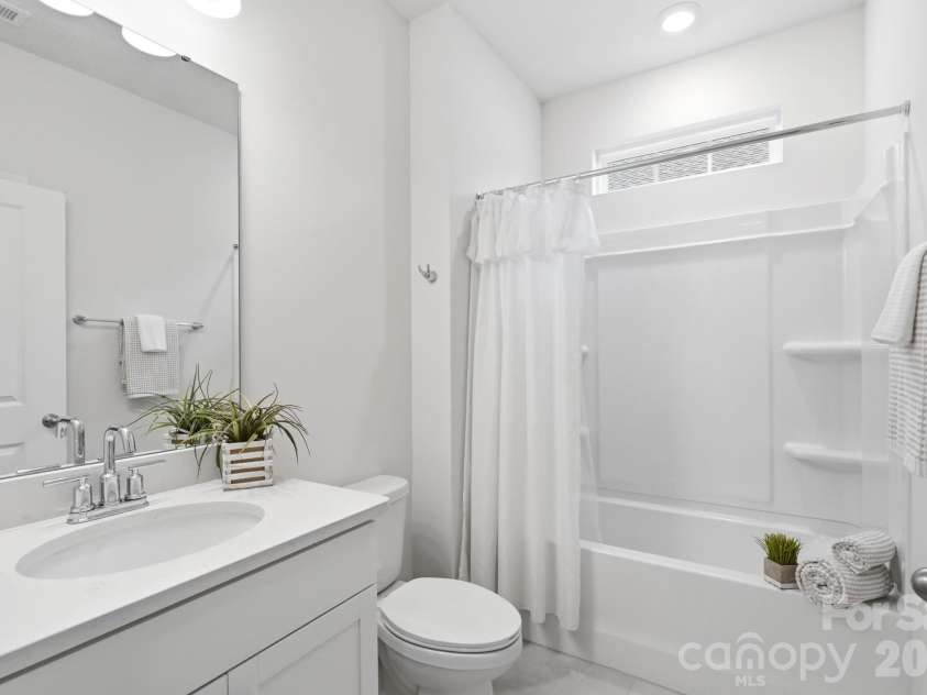 115 Shayna Road, Troutman, NC 28166.  MLS# CAR4407624, YatesRealty ID 40740. Stylish finishes continue into the full bathroom.