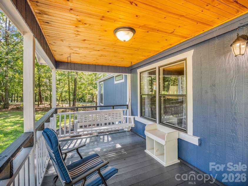 1120 Sandy Plains Road, Tryon, NC 28782.  MLS# CAR4407780, YatesRealty ID 40748. Front Porch in the Country on Sandy Plains - It's nice!