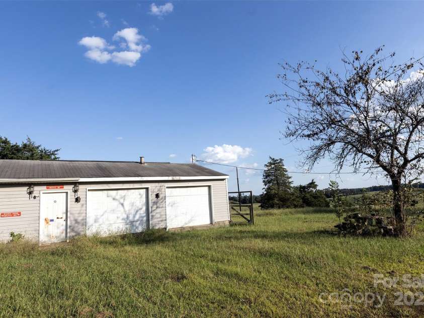 9600 Mount Olive Road, Mount Pleasant, NC 28124.  MLS# CAR4302163, YatesRealty ID 4075. OUTBUILDING BEHIND HOUSE