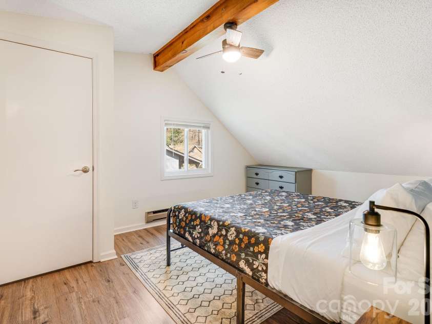 21 Susan Drive, Maggie Valley, NC 28751.  MLS# CAR4241989, YatesRealty ID 4076. Bedroom # 3 Upstairs with attached bathroom