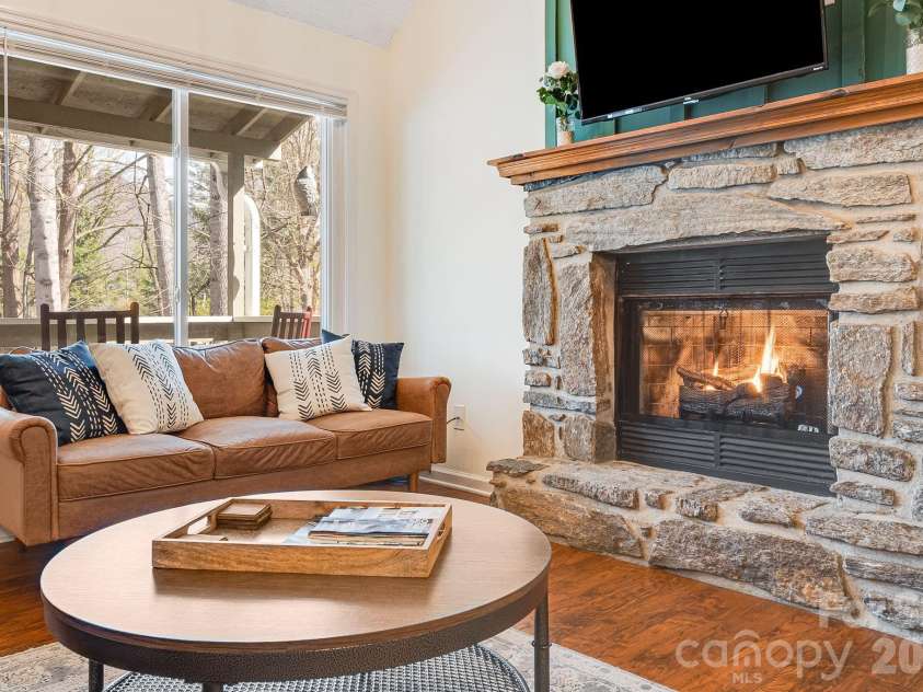 21 Susan Drive, Maggie Valley, NC 28751.  MLS# CAR4241989, YatesRealty ID 4076. Fireplace