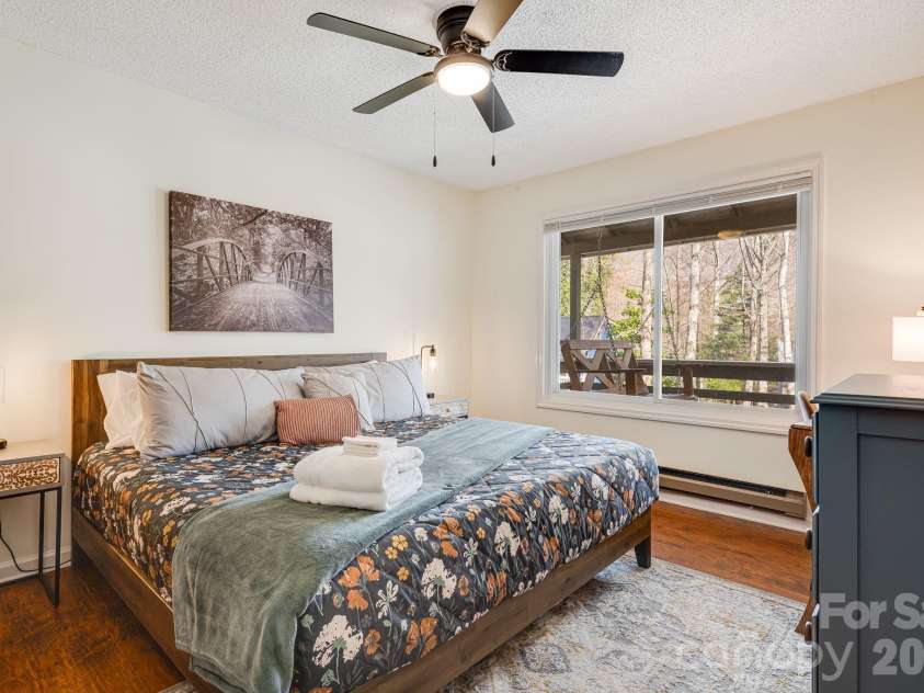 21 Susan Drive, Maggie Valley, NC 28751.  MLS# CAR4241989, YatesRealty ID 4076. Primary Bedroom on the main level