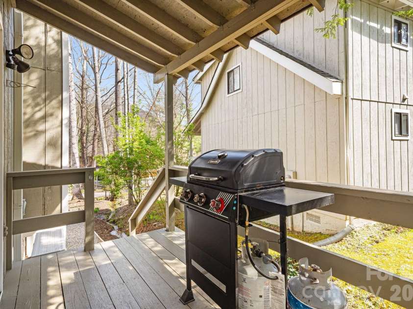 21 Susan Drive, Maggie Valley, NC 28751.  MLS# CAR4241989, YatesRealty ID 4076. Side Deck, perfect for grilling out
