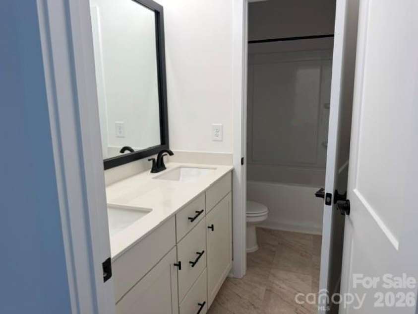 1305 Gardenia Drive, Mt Ulla, NC 28125.  MLS# CAR4410312, YatesRealty ID 40773. Full bathroom in basement