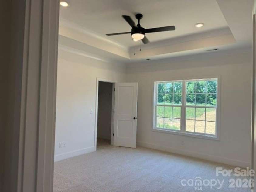 1305 Gardenia Drive, Mt Ulla, NC 28125.  MLS# CAR4410312, YatesRealty ID 40773. Primary Bedroom with tray ceiling