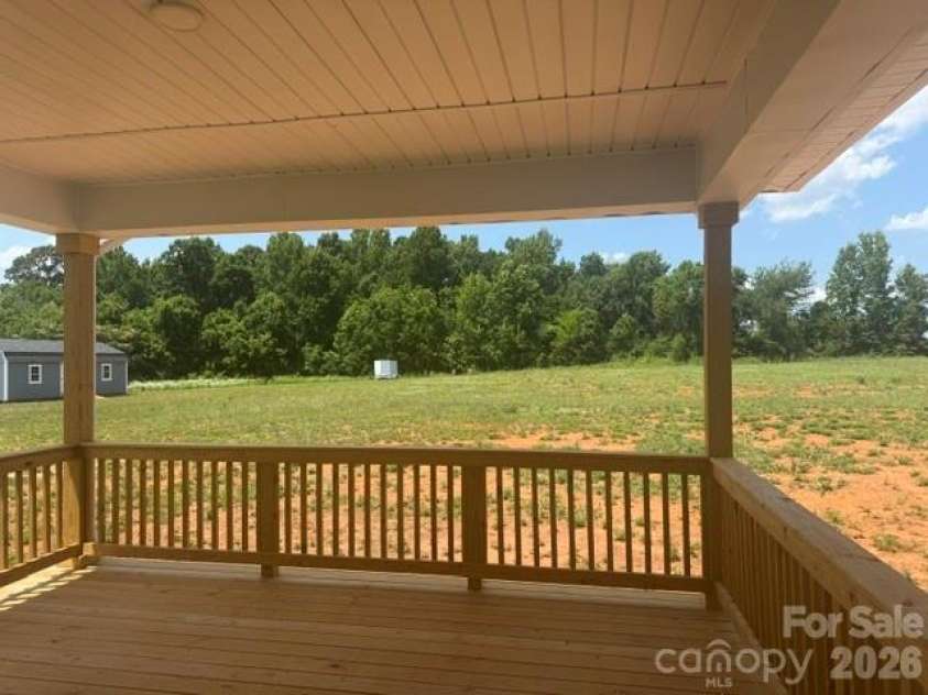 1390 Gardenia Drive, Mt Ulla, NC 28125.  MLS# CAR4410315, YatesRealty ID 40774. 16X14 Covered Deck