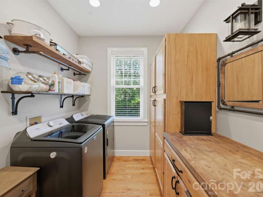 292 Charter Ridge, Jefferson, NC 28640.  MLS# CAR4410059, YatesRealty ID 40779. Laundry room on main level