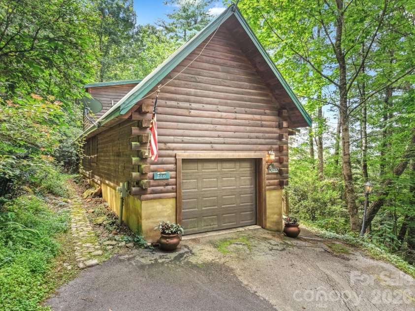 226 Signal Ridge, Sylva, NC 28779.  MLS# CAR4410234, YatesRealty ID 40786. Garage