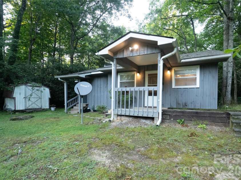 242 Whitewater Road, Sapphire, NC 28774.  MLS# CAR4410402, YatesRealty ID 40787. Front of home