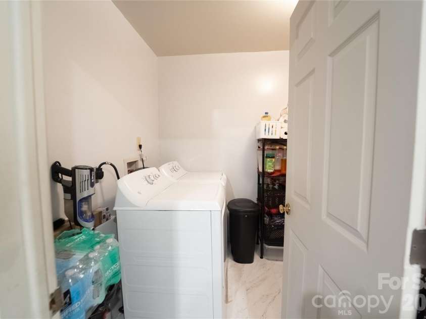 242 Whitewater Road, Sapphire, NC 28774.  MLS# CAR4410402, YatesRealty ID 40787. Laundry/utility room
