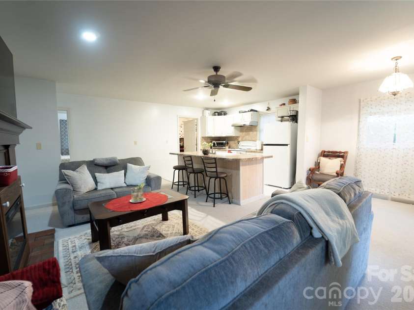 242 Whitewater Road, Sapphire, NC 28774.  MLS# CAR4410402, YatesRealty ID 40787. Main living space