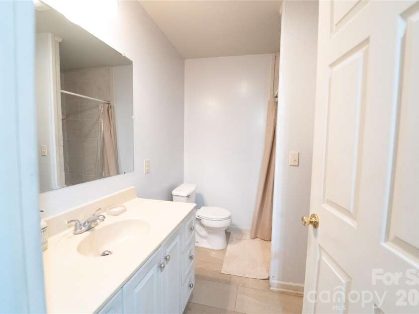 242 Whitewater Road, Sapphire, NC 28774.  MLS# CAR4410402, YatesRealty ID 40787. Shared bathroom
