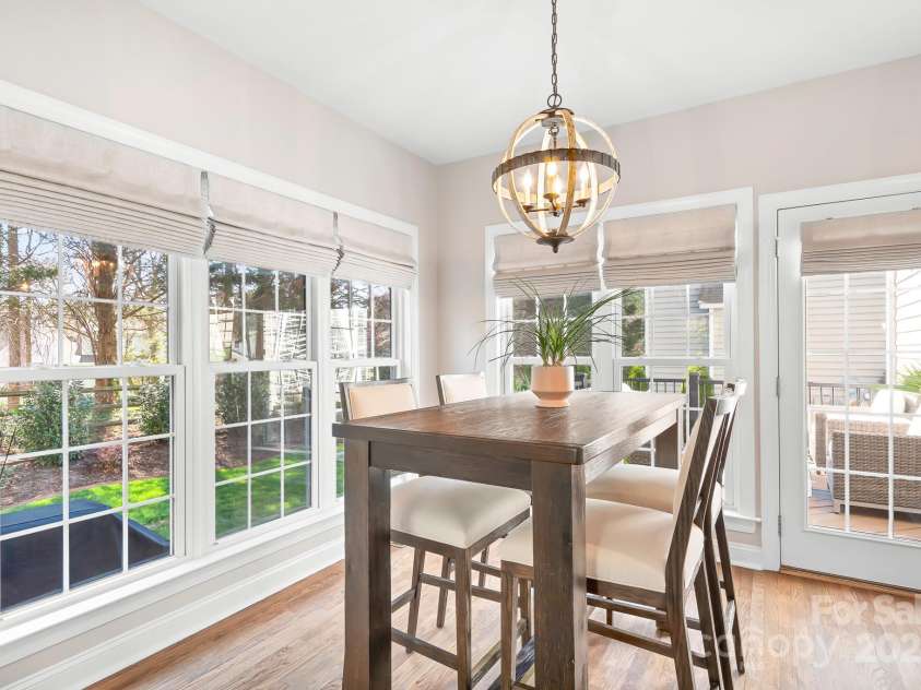 15124 Hugh Mcauley Road, Huntersville, NC 28078.  MLS# CAR4234988, YatesRealty ID 4079. Breakfast room over looking a lush yard and deck. Lots of light all day!