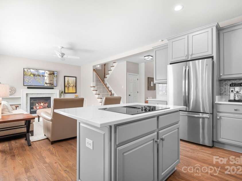 15124 Hugh Mcauley Road, Huntersville, NC 28078.  MLS# CAR4234988, YatesRealty ID 4079. Kitchen looking into the open concept family room.