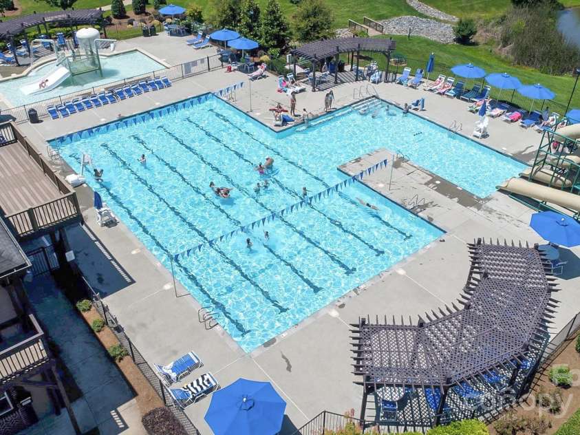 15124 Hugh Mcauley Road, Huntersville, NC 28078.  MLS# CAR4234988, YatesRealty ID 4079. Macaulay is know for it's wonderful amenities. This shows the clubhouse, pool and splash pad.