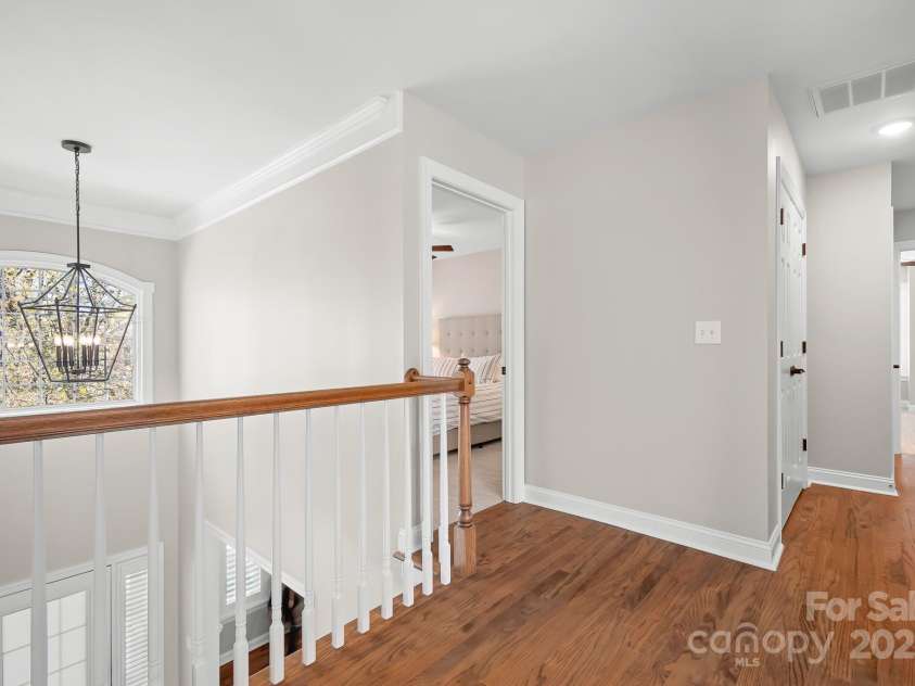 15124 Hugh Mcauley Road, Huntersville, NC 28078.  MLS# CAR4234988, YatesRealty ID 4079. Upstairs hall with gleaming new hardwoods