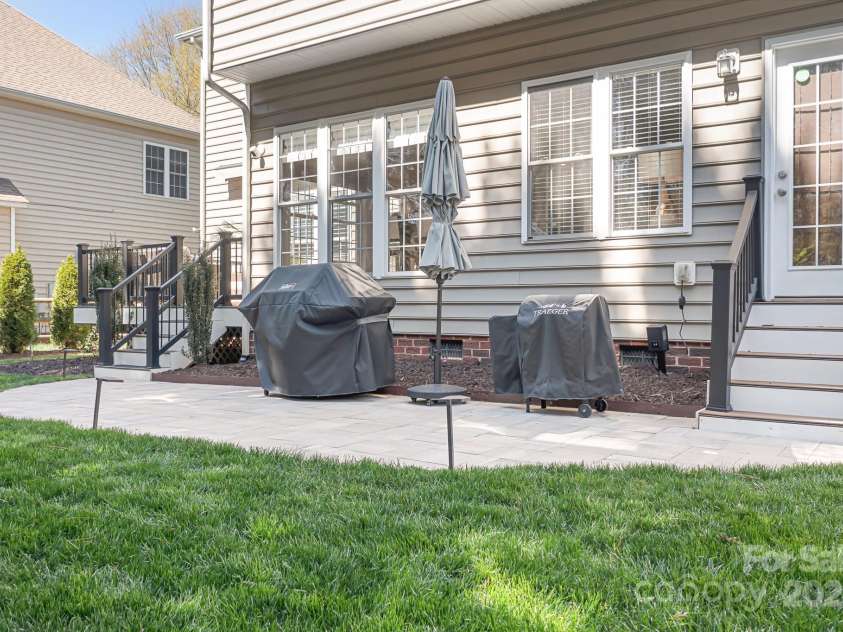 15124 Hugh Mcauley Road, Huntersville, NC 28078.  MLS# CAR4234988, YatesRealty ID 4079. Well manicured lawn with irrigation that operates by wifi.