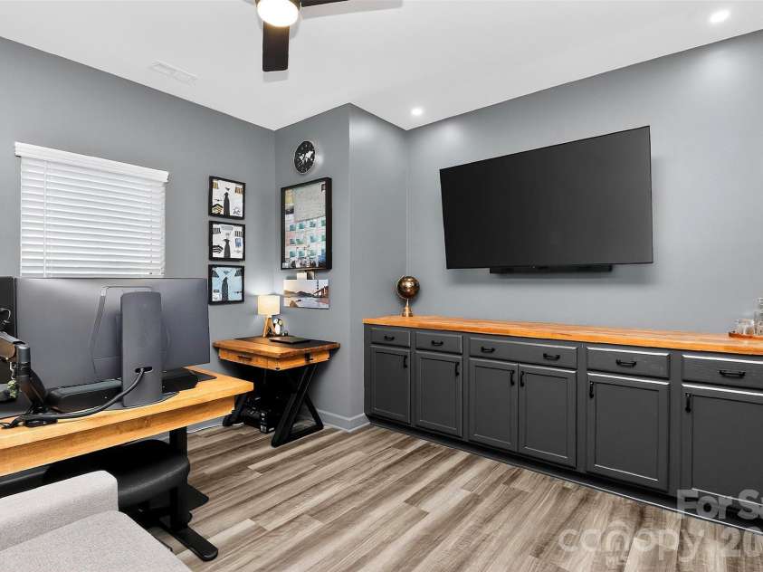 4514 Bright Road, Charlotte, NC 28214.  MLS# CAR4396374, YatesRealty ID 40790. Flex room with custom cabinets