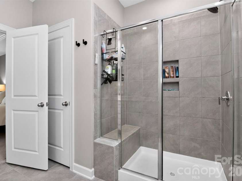 4514 Bright Road, Charlotte, NC 28214.  MLS# CAR4396374, YatesRealty ID 40790. Large tiled shower