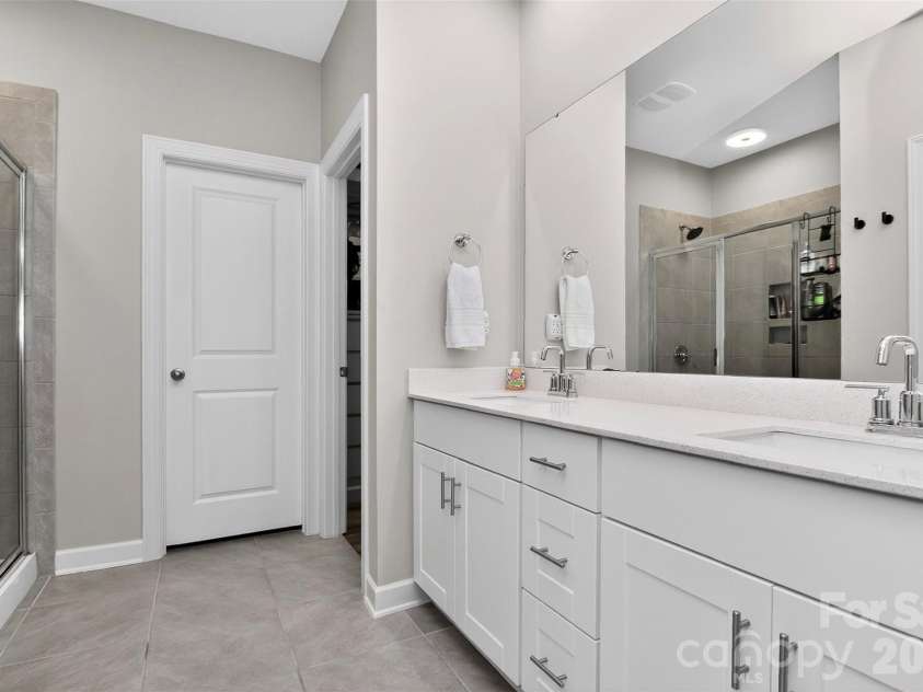 4514 Bright Road, Charlotte, NC 28214.  MLS# CAR4396374, YatesRealty ID 40790. Primary bathroom with double sinks