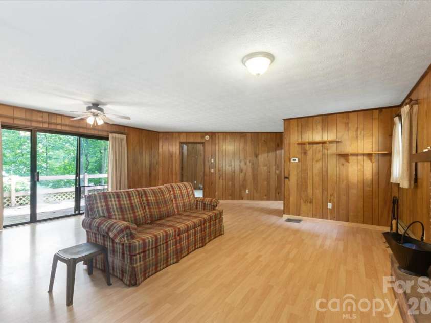 188 Woodfern Drive, Maggie Valley, NC 28751.  MLS# CAR4409833, YatesRealty ID 40792. Living room/dining area from front door