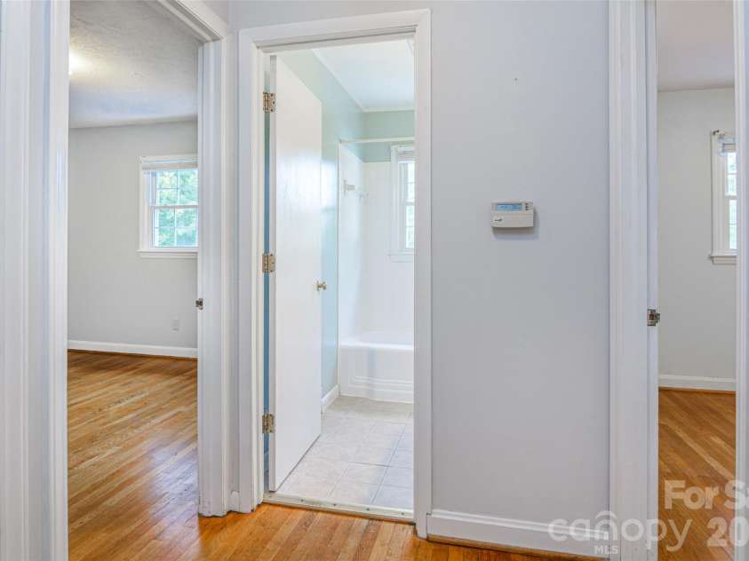 352 Cedar Lane, Arden, NC 28704.  MLS# CAR4391358, YatesRealty ID 40799. Hallway Between Bedrooms Two and Three