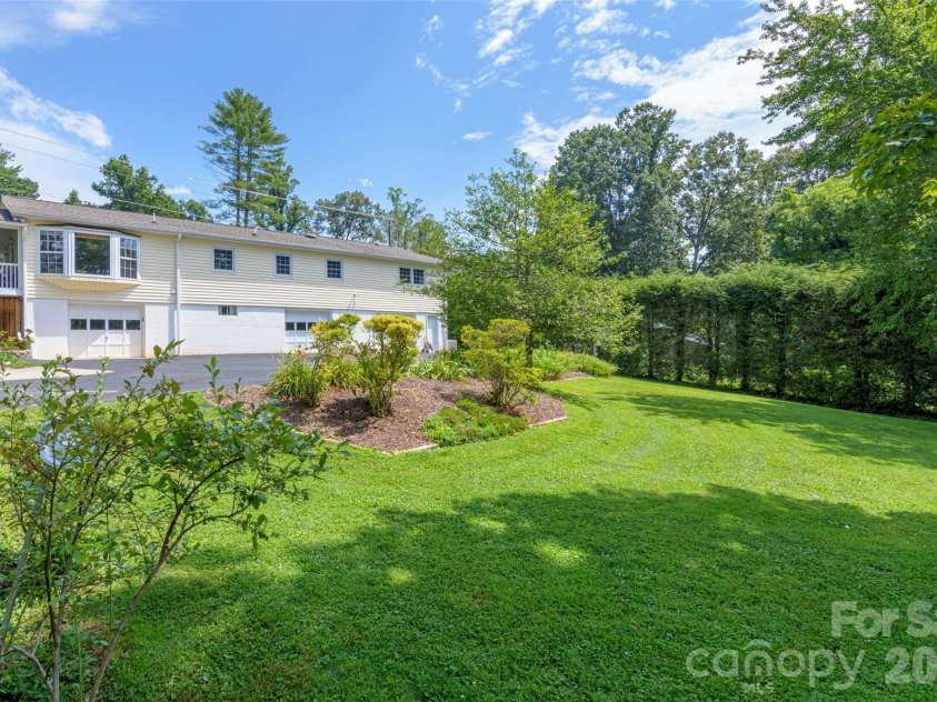 352 Cedar Lane, Arden, NC 28704.  MLS# CAR4391358, YatesRealty ID 40799. Large Back Yard