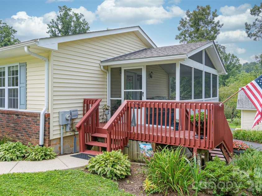 352 Cedar Lane, Arden, NC 28704.  MLS# CAR4391358, YatesRealty ID 40799. Screened Deck Entrance from Front