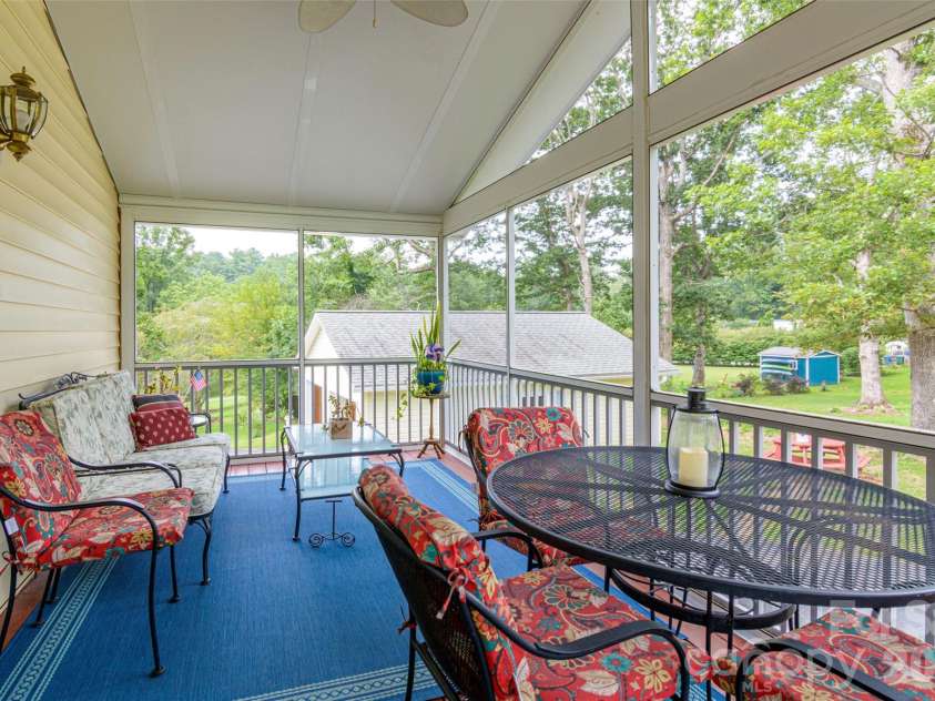 352 Cedar Lane, Arden, NC 28704.  MLS# CAR4391358, YatesRealty ID 40799. Screened Porch