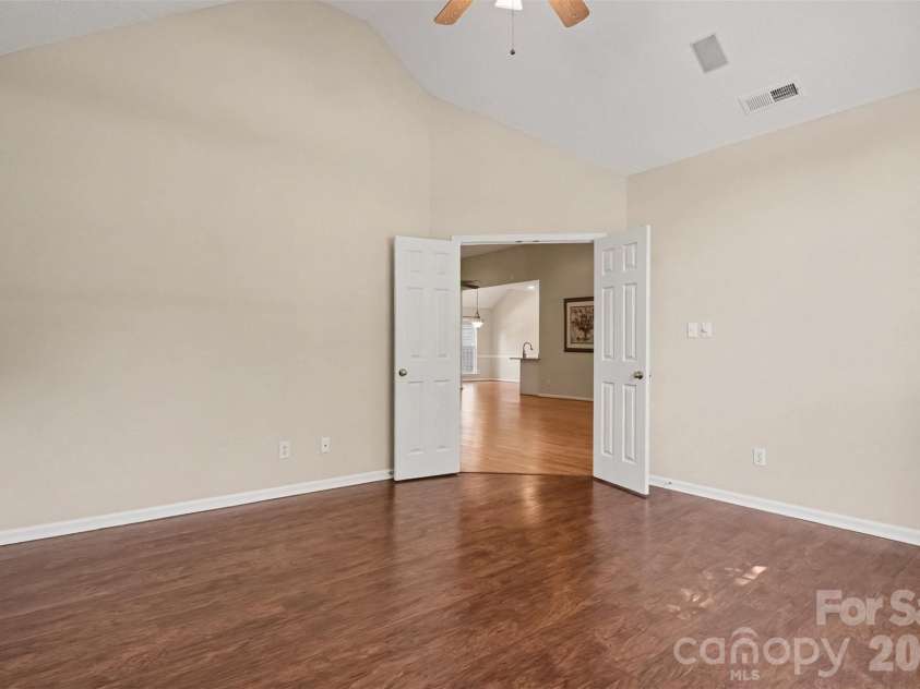 576 Gatsby Place, Concord, NC 28027.  MLS# CAR4403002, YatesRealty ID 40800. An alternative view of the study, highlighting the double doors that provide enhanced accessibility and optimal privacy.