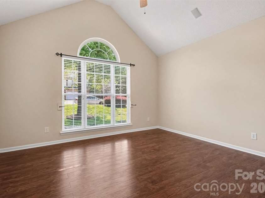 576 Gatsby Place, Concord, NC 28027.  MLS# CAR4403002, YatesRealty ID 40800. This bright and inviting front study features vaulted ceilings, an overhead ceiling fan, high-quality flooring, and a neutral color palette throughout.