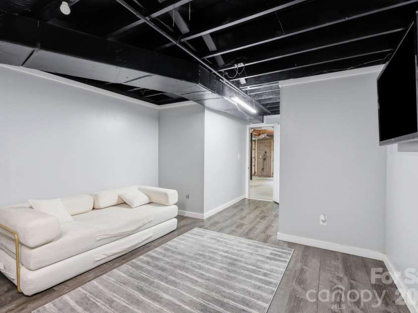 202 Riva Ridge Drive, Fairview, NC 28730.  MLS# CAR4397168, YatesRealty ID 40805. Basement den