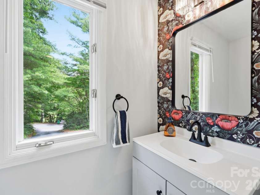 202 Riva Ridge Drive, Fairview, NC 28730.  MLS# CAR4397168, YatesRealty ID 40805. Half bath main level