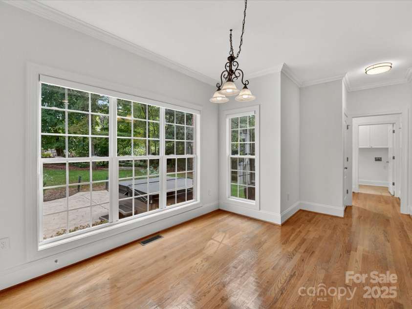 10007 Devereaux Drive, Matthews, NC 28105.  MLS# CAR4307264, YatesRealty ID 40812. Breakfast area looking towards the dropzone and laundry room